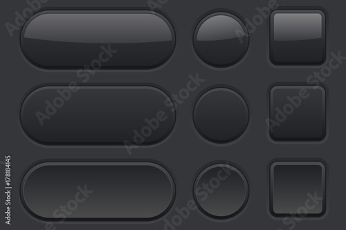 Black plastic buttons on black background