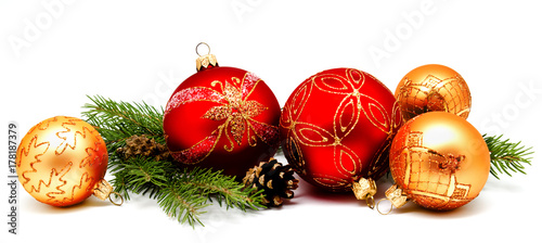 Christmas decoration red golden yellow balls with fir cones and fir tree
