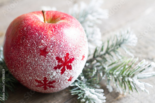 Christmas snowy apple with  tree abstract background concept 
