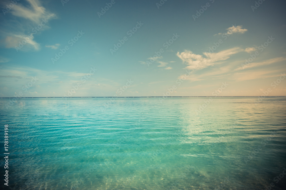 Beautiful blue sea and sky with long horizon. Tranquil nature landscape banner
