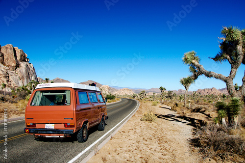 Desert road trip in an Old camper Fototapeta