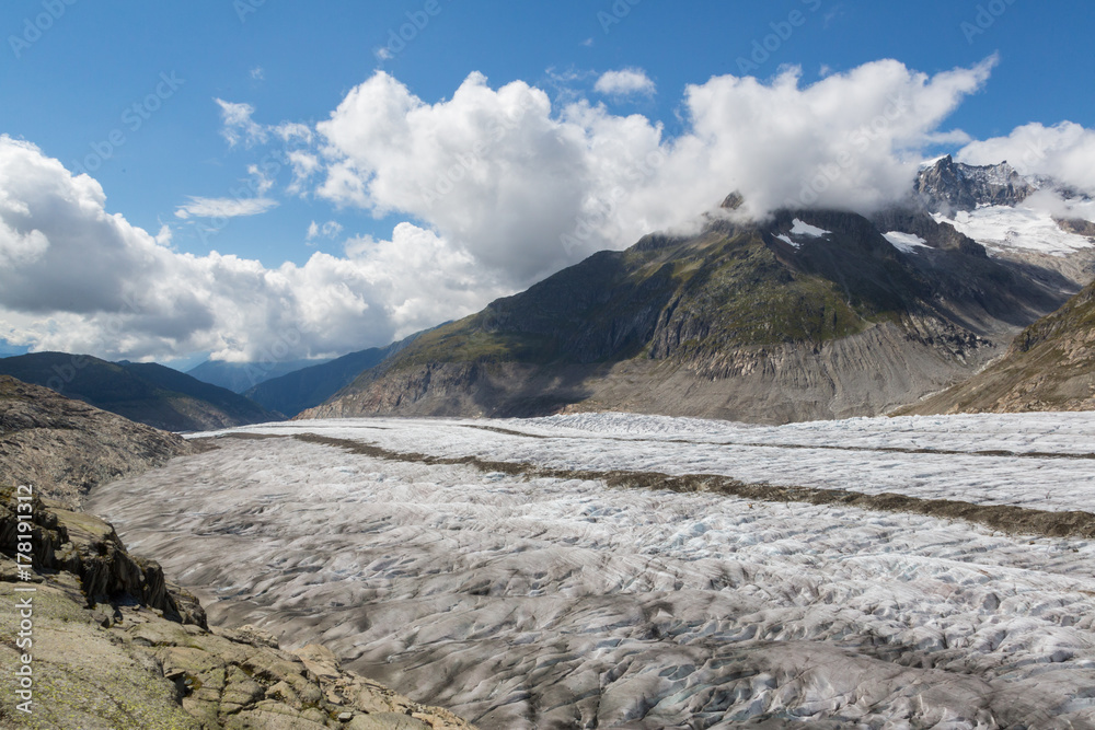 glacier Aletsch with blue sky and clouds
