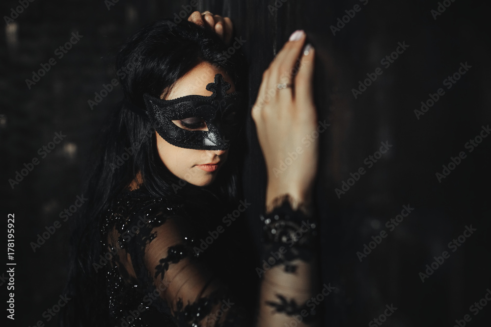 beautiful sensual woman  in the dark room