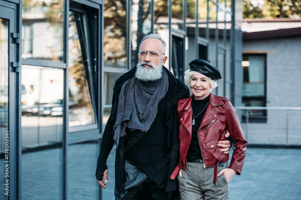 stylish senior couple walking on street stylish senior couple walking on street