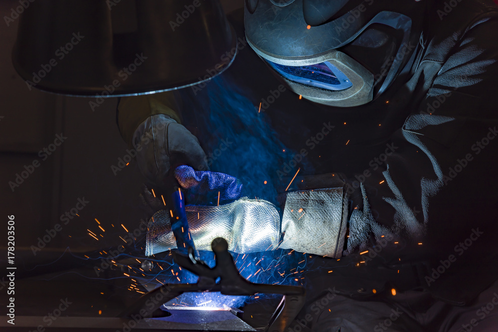 Industrial steel welder in factory Industrial steel welder in factory