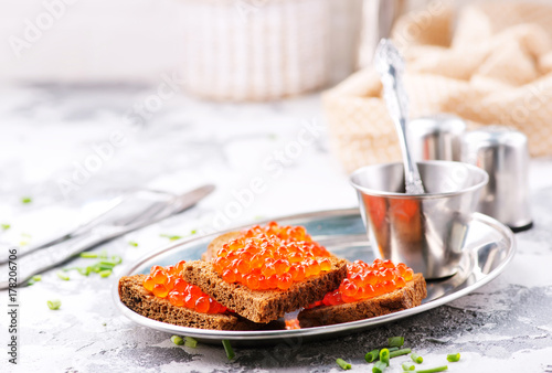 bread with red salmon caviar