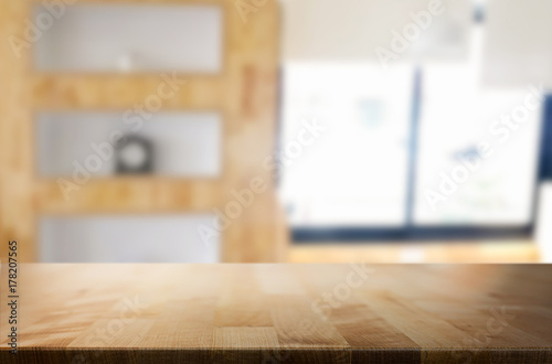 Fototapeta Naklejka Na Ścianę i Meble -  Empty of wood table top on blur of window glass in the morning background. for your photomontage or product display.