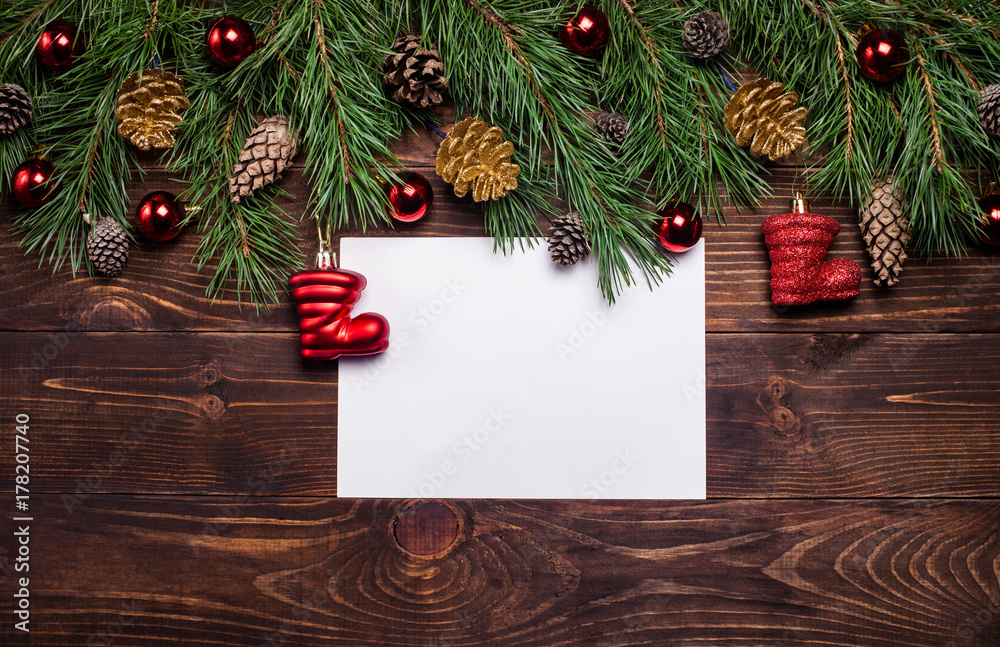Fototapeta premium Christmas, New Year wooden background, paper with empty space for text