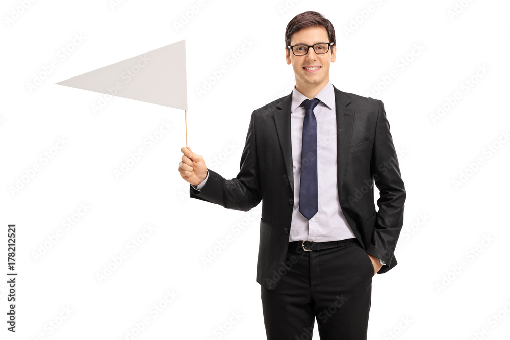 Young businessman holding a white flag Young businessman holding a white flag