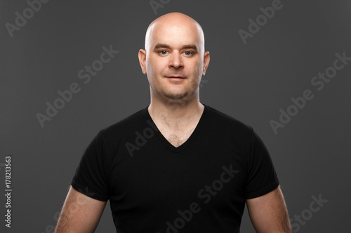 bald man in a T-shirt
