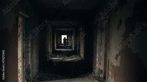 Wallpaper Mural Young attractive military woman holding automatic rifle and looking at camera. Torontodigital.ca