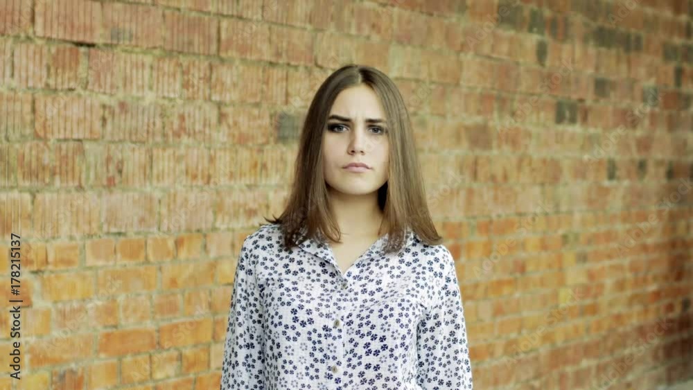 Teen girl student shaking head. No sign. Say no Teen girl student shaking head. No sign. Say no
