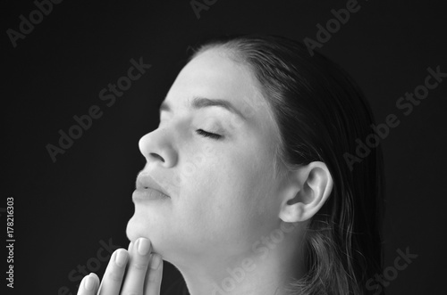  portrait of black and white woman, peace and quiet, praying and meditating