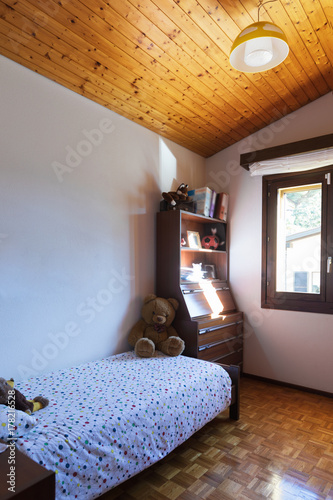 Bedroom with floor and wooden ceiling photo