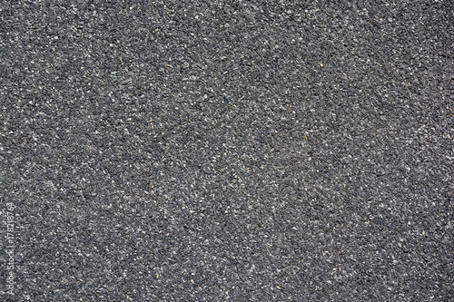 Abstract background of closeup dark asphalt