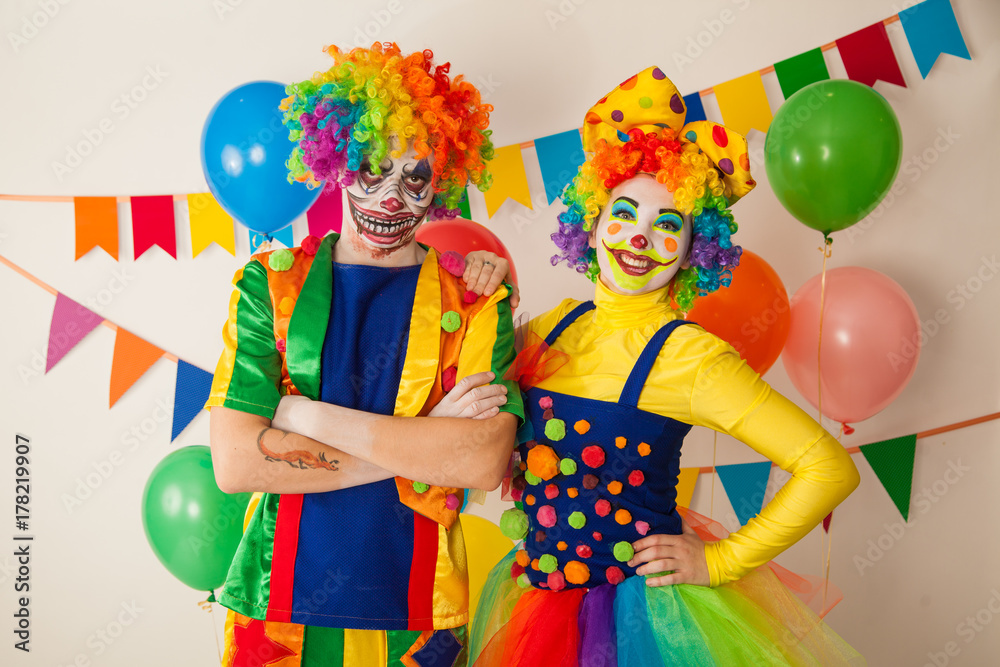 a terrible clown and a good clown. Halloween. The crazy clown and clowness. a terrible clown and a good clown. Halloween. The crazy clown and clowness.