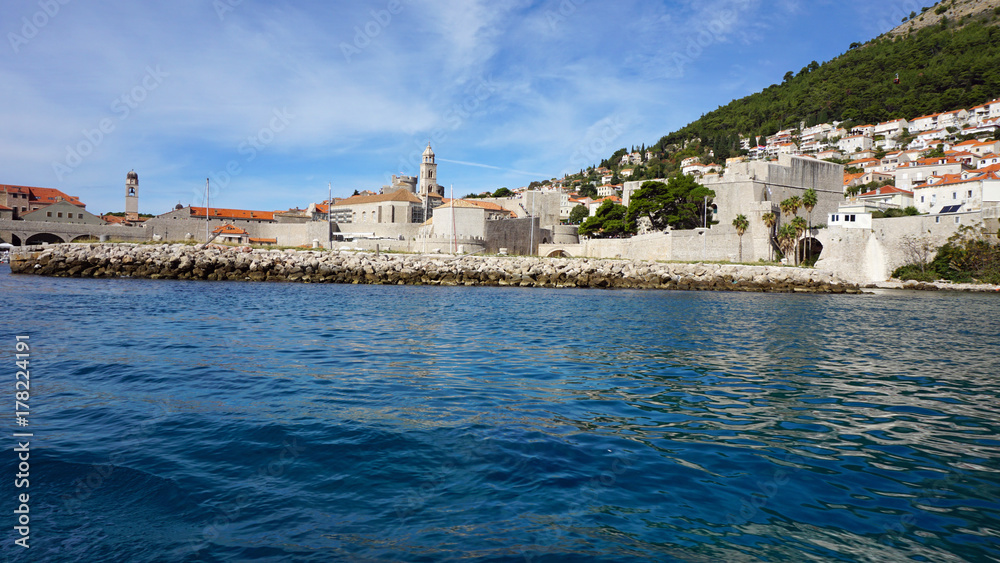 wild coast of croatian town dubrovnik from a boat