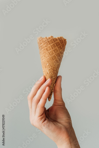 woman holding ice cream cone
