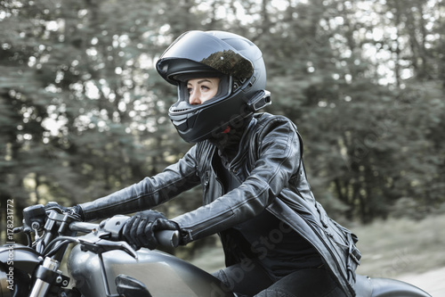 Young woman driving motorcycle © Kaponia Aliaksei