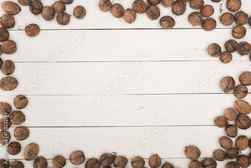 Wallpaper Mural walnuts on wooden table Torontodigital.ca