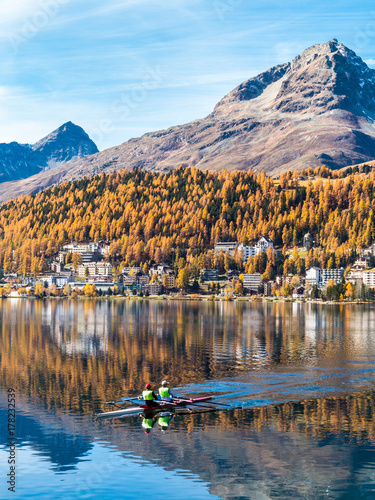 Canoe on lake of St. Moritz in Engadine. Water sport photo