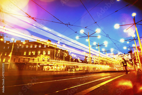 Night view of public transportation hub on jakominiplatz in austrian city graz photo