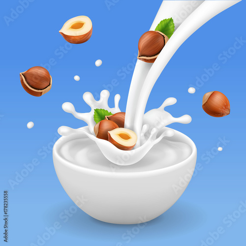 Flowing Milk and bowl with hazelnuts. Yogurt splash and Nuts dessert