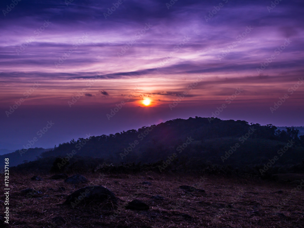 The sun rises between the cloud and mountainn in Mon Jong, Chiangmai, Thailand.