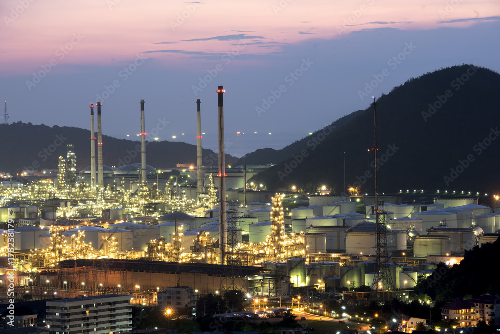 Aerial view Oil refinery.Industrial view at oil refinery plant form industry zone with sunset and cloudy sky.