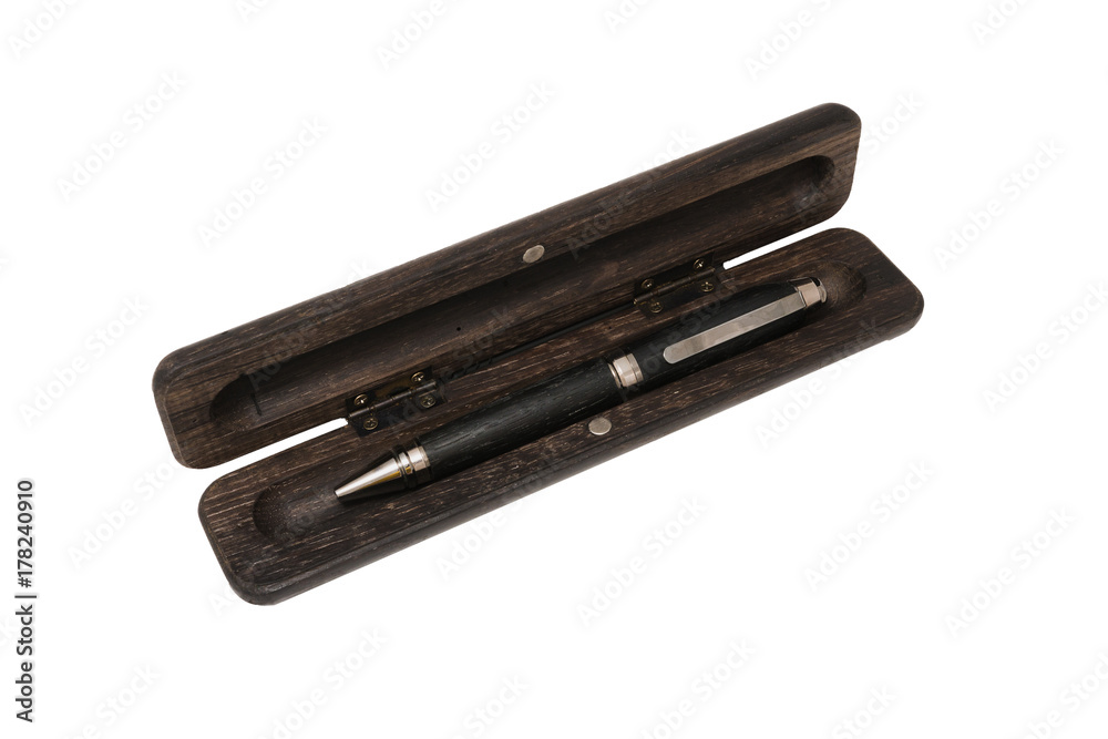 A pencil case for a ballpoint pen made from old oak on a white background A pencil case for a ballpoint pen made from old oak on a white background