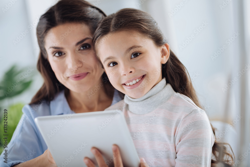 Happy cute girl spending time with her mother Happy cute girl spending time with her mother