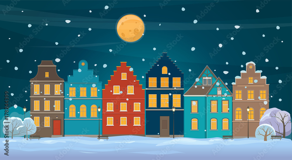 Winter background with old town at night