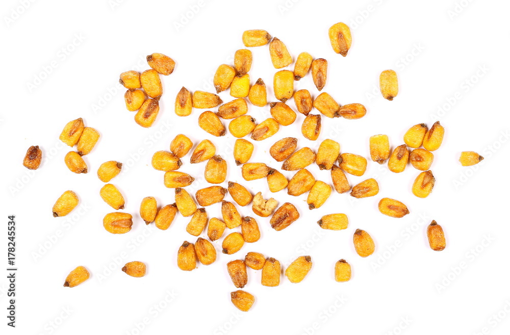 Fried salty corn grains isolated on white background, for popcorn, top view Fried salty corn grains isolated on white background, for popcorn, top view