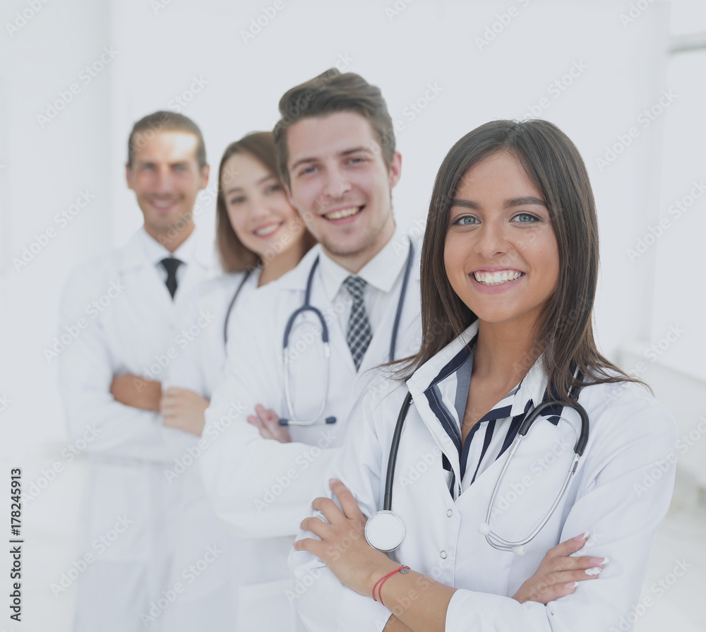 female doctor with group of happy successful colleagues female doctor with group of happy successful colleagues