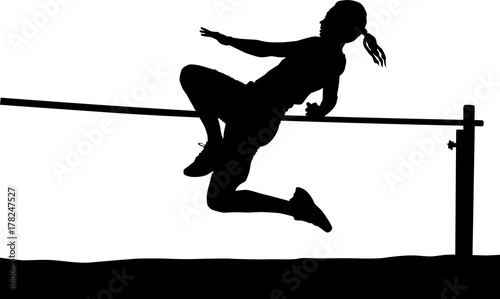 female high jumper clearing bar photo