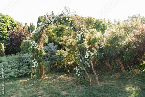 Place for wedding ceremony on grass photo