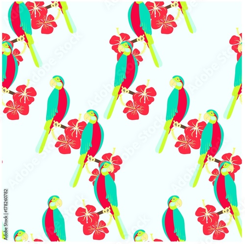 Seamless background with colorful parrot, hibiscus flowers on light blue stock vector illustration