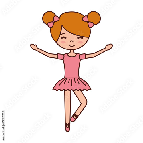 the little girl danced ballet with tutu dress and bun hair