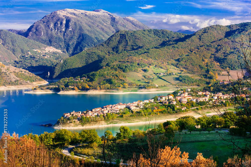 beautiful lake Turano and village Colle di tora. Rieti province, Italy  Photos | Adobe Stock