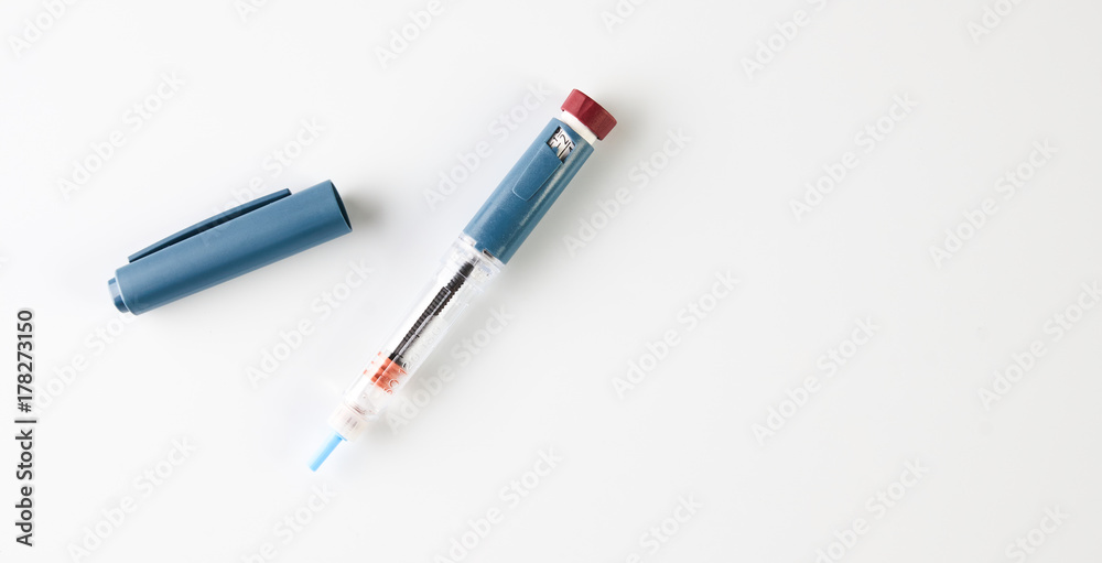 Insulin pen or insulin injector isolated on white
