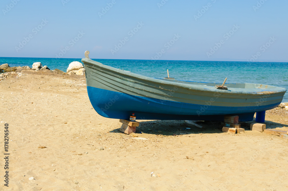 Rowing boat on a beach on the Greek island of Zakynthos Rowing boat on a beach on the Greek island of Zakynthos