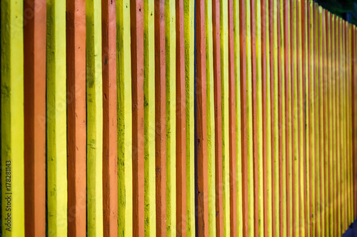 Fototapeta Naklejka Na Ścianę i Meble -  Multicolored Wooden Fence
