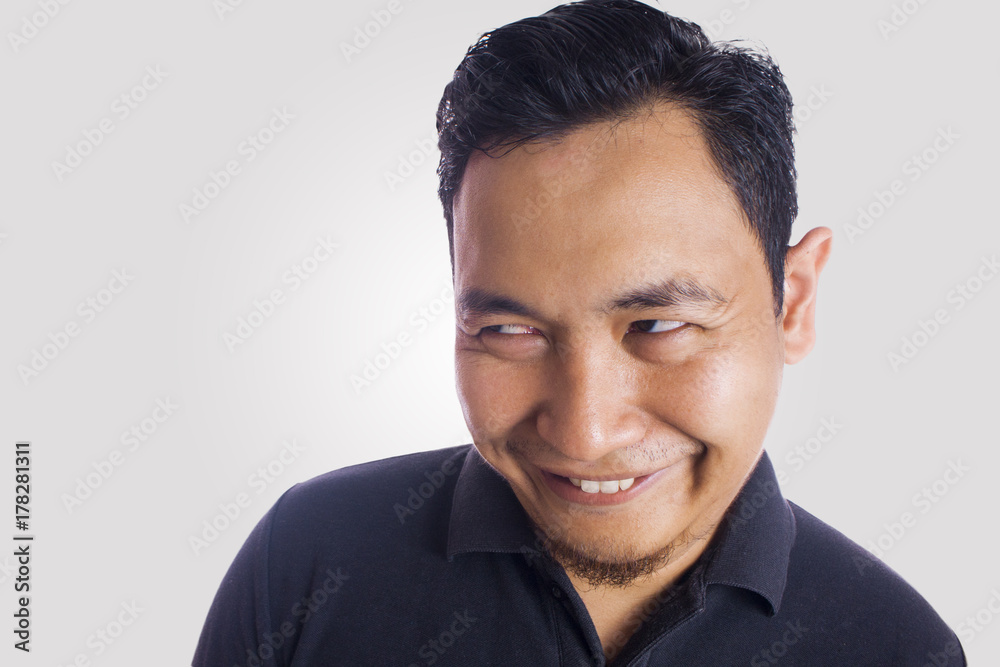 Funny Asian Man Close Up Smiling Thinking Face фотография Stock | Adobe  Stock