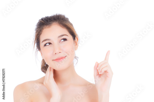 Portrait of beautiful asian woman makeup of cosmetic - girl hand touch cheek and pointing something attractive face with skin healthcare concept isolated on white background.