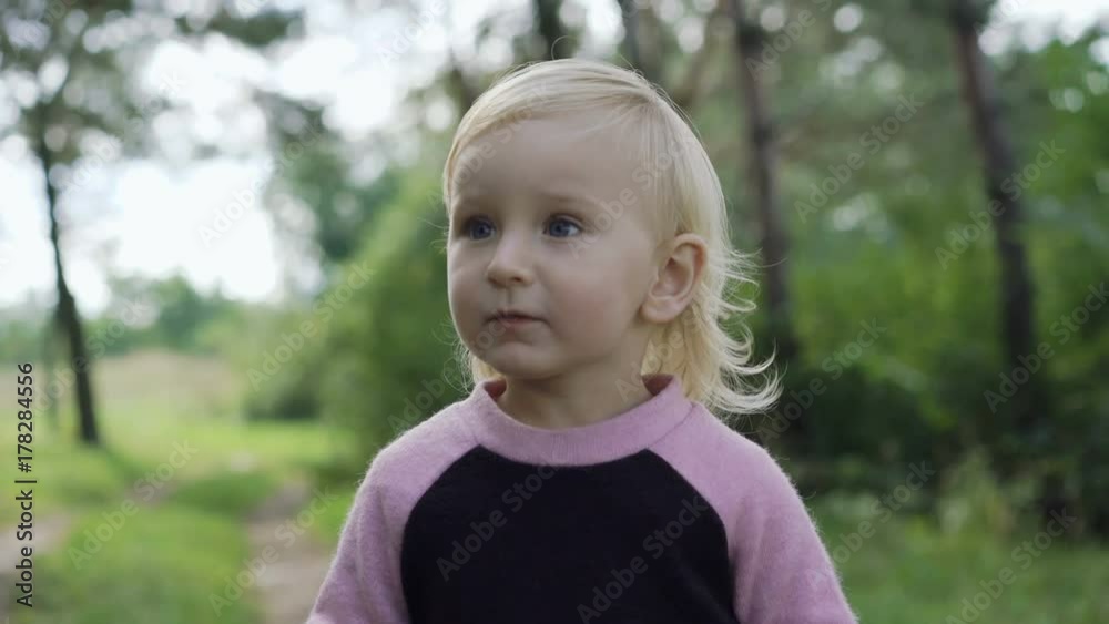 Little girl plays with balloons in the park and laughing 4K Little girl plays with balloons in the park and laughing 4K