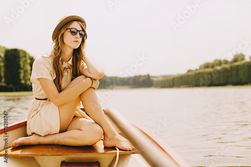 Girl on a row boat at Versailles photo