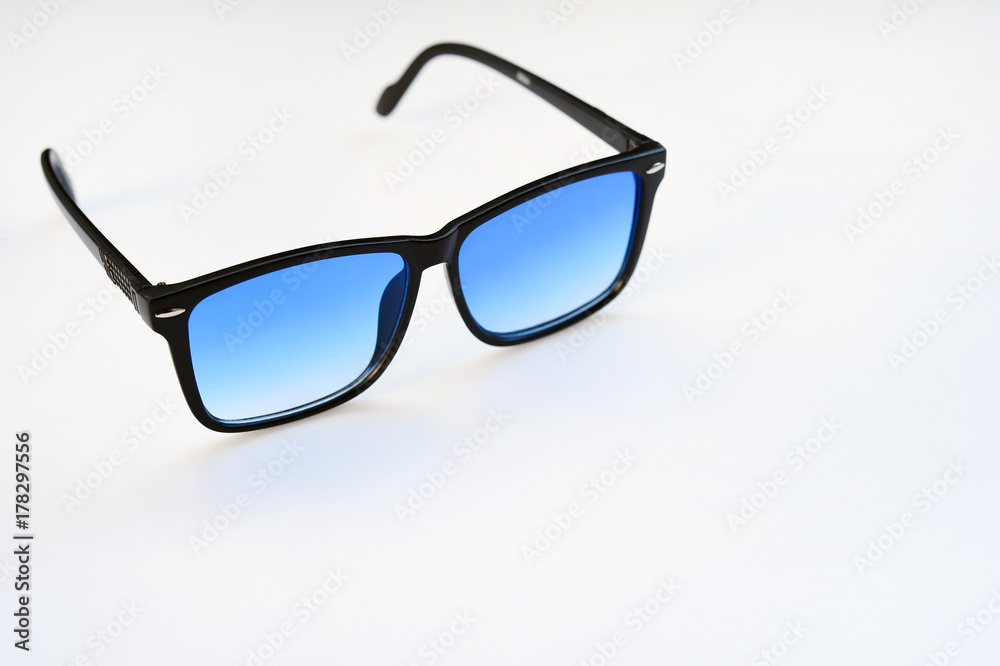Modern fashionable sunglasses isolated on white background