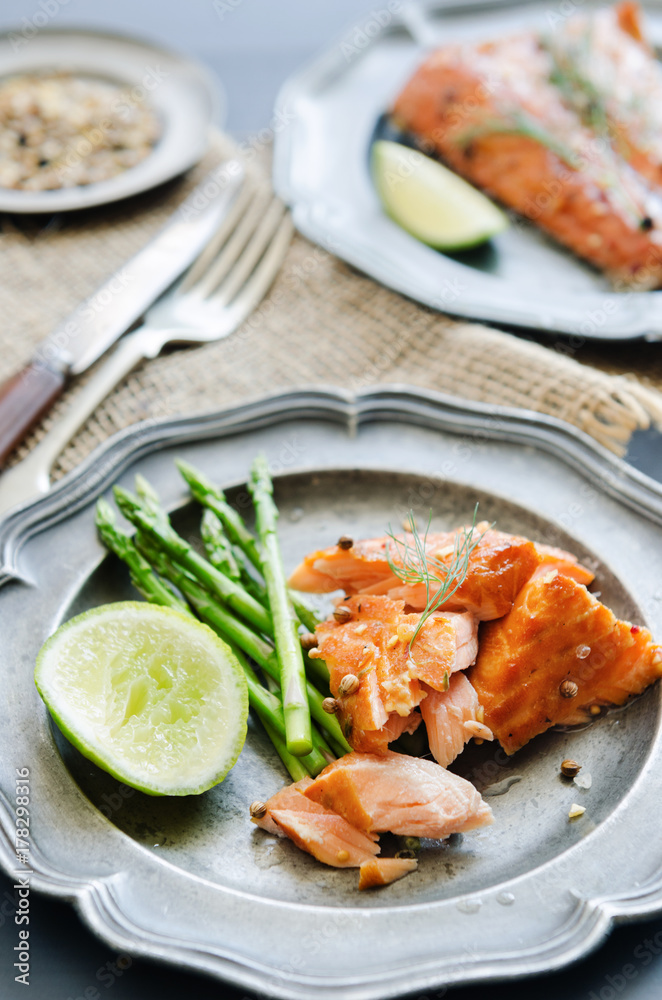 Gourmet salmon meal with asparagus and lime Gourmet salmon meal with asparagus and lime