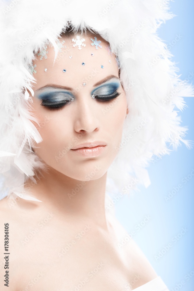 Artistic photo of glamorous woman in winter makeup