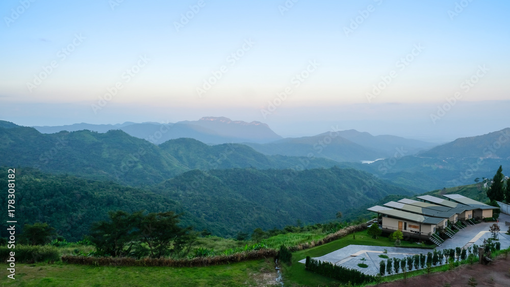 Resort on the top of hill with beautiful mountain and mist view